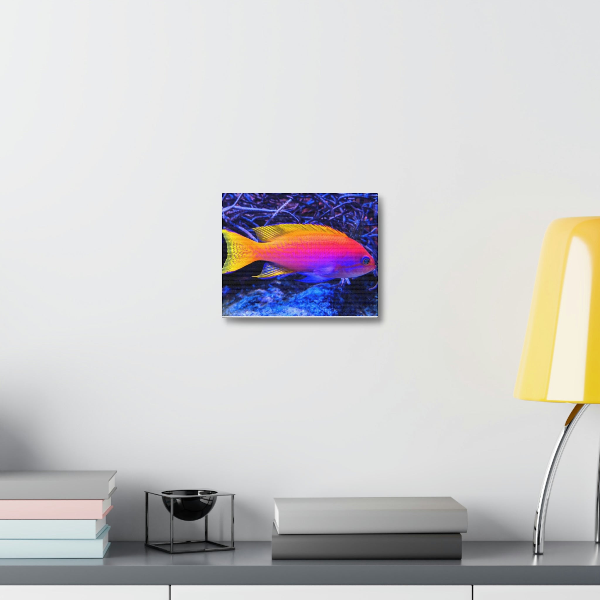 A vibrant stretched canvas featuring colorful fish swimming in a lively underwater scene, perfect for indoor decoration.