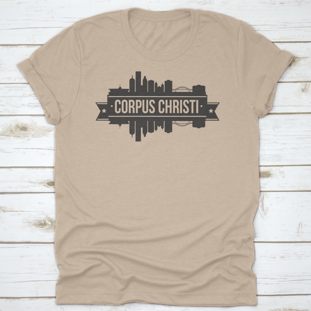 A stylish t-shirt featuring the skyline of Corpus Christi, Texas, showcasing its iconic buildings and vibrant colors.