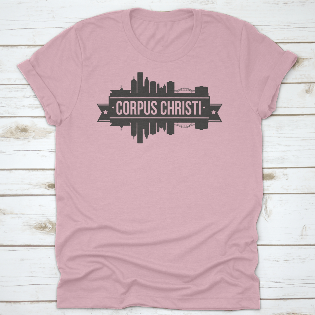 A stylish t-shirt featuring the skyline of Corpus Christi, Texas, showcasing its iconic buildings and vibrant colors.