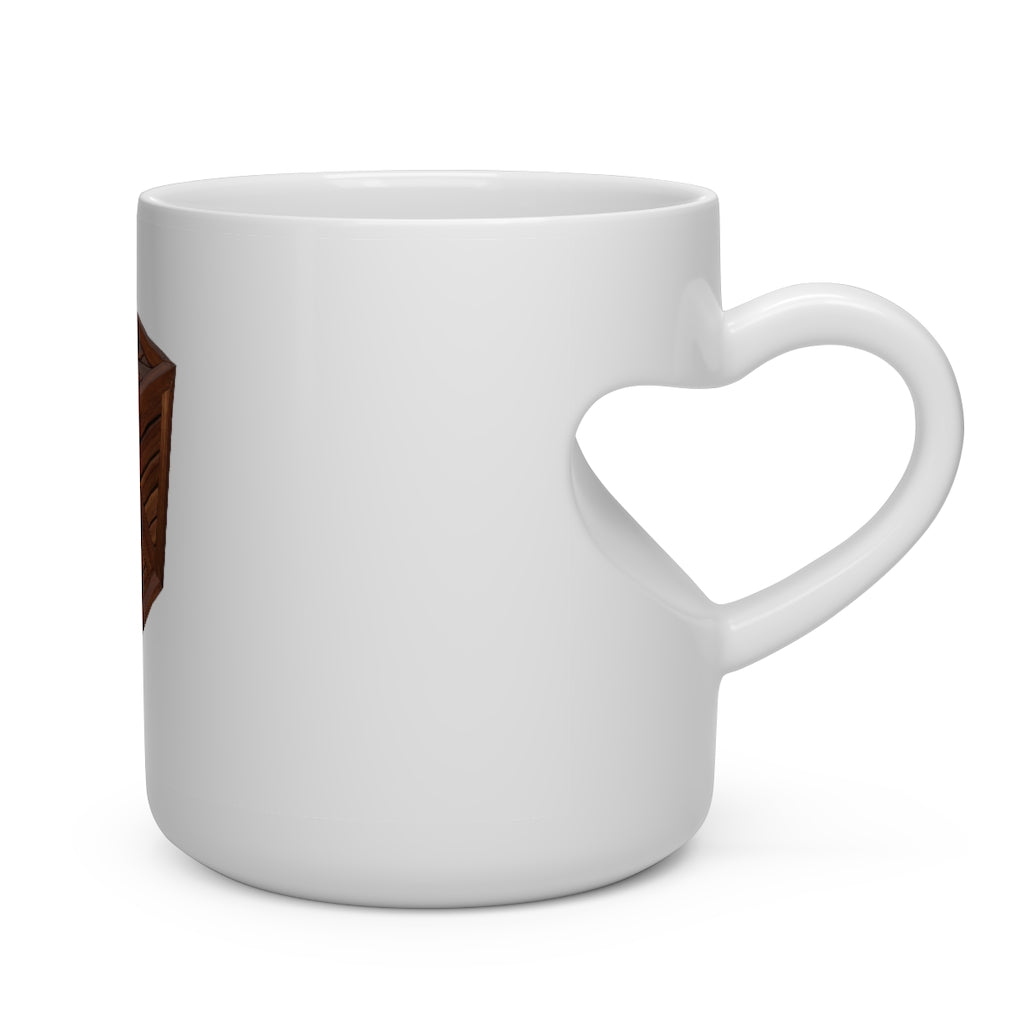 A charming white ceramic mug shaped like a heart with a heart-shaped handle, perfect for hot beverages.