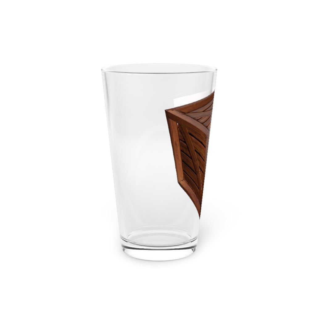 A clear 16oz Crate Pint Glass showcasing its elegant design, perfect for personalized printing.