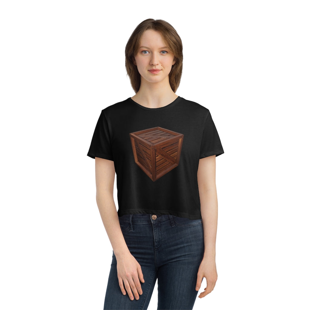 A stylish Crate Women's Flowy Cropped Tee in a light fabric, showcasing its flowy fit and modest crop design.