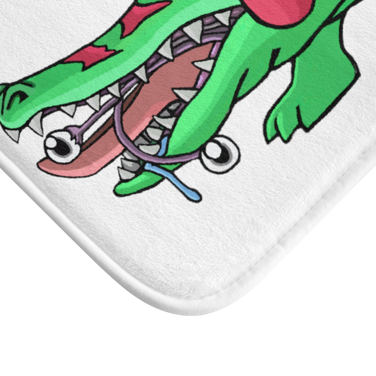 Crocodilas Bath Mat featuring a stylish design with anti-slip backing, made from soft microfiber, available in two sizes.