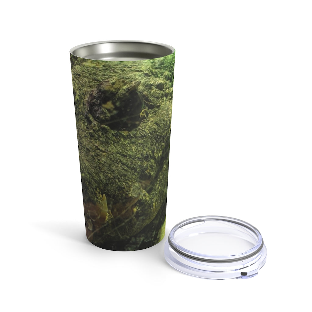 Crocodile Tumbler 20oz in stainless steel with a see-thru plastic lid, showcasing its sleek design and rounded corners.