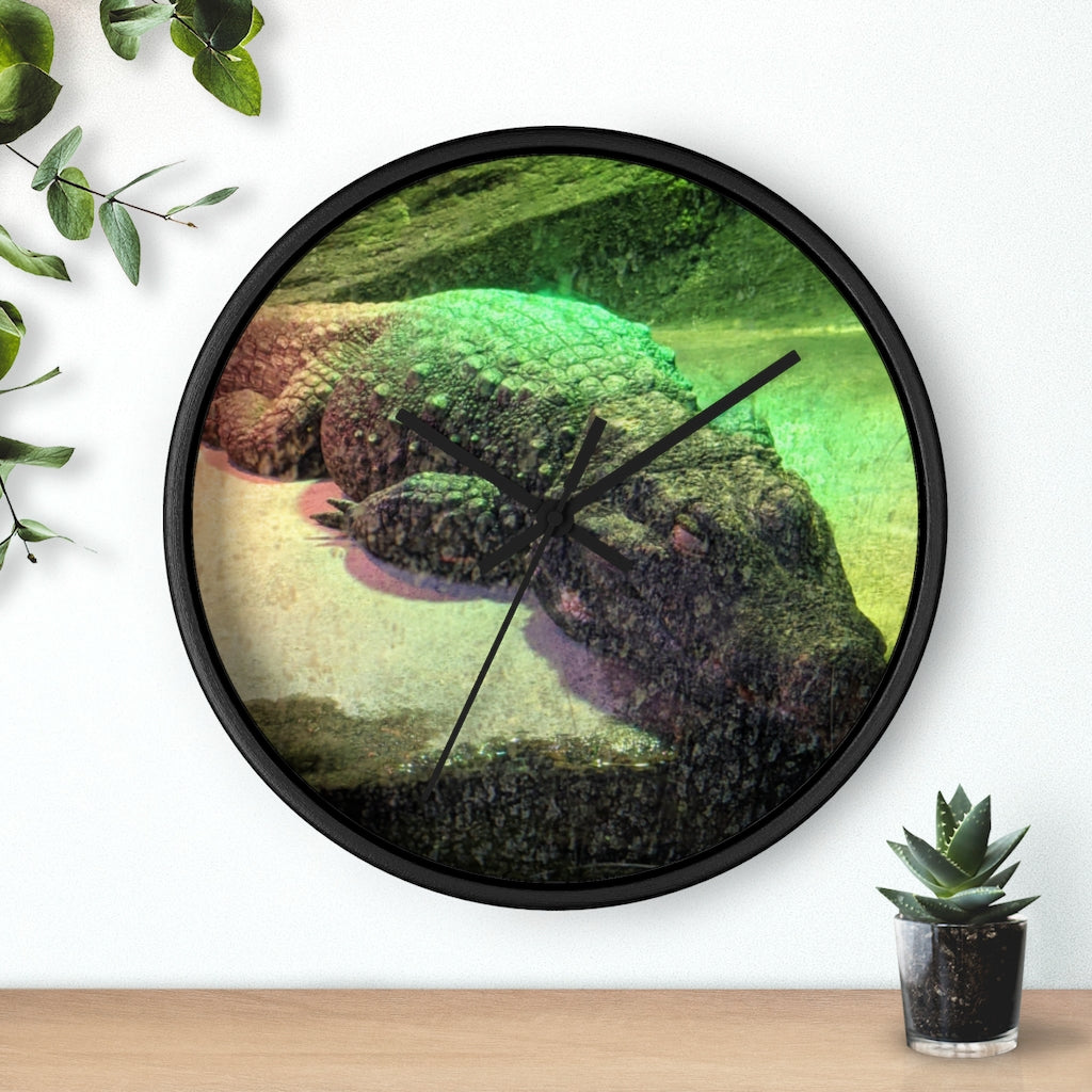 A stylish Crocodile Wall Clock featuring a unique crocodile design with a wooden frame and plexiglass face, perfect for indoor decor.