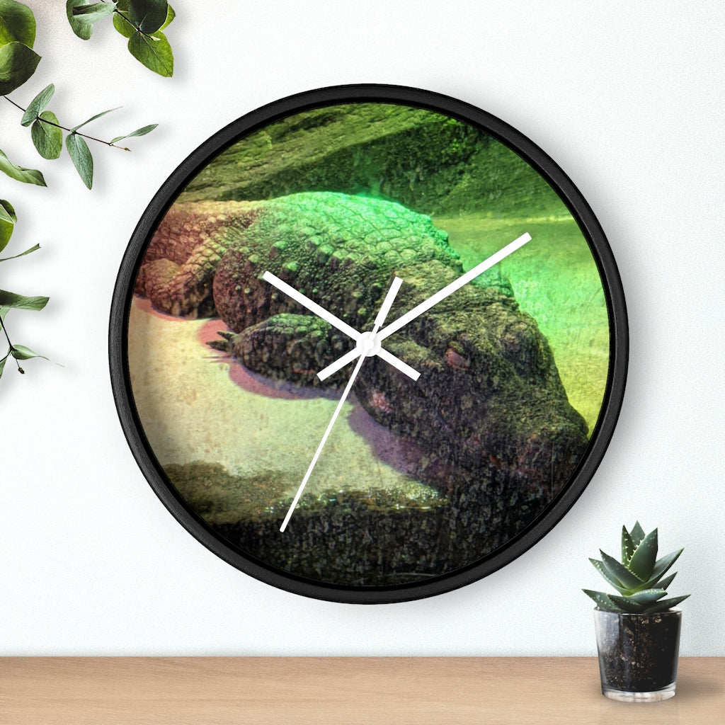 A stylish Crocodile Wall Clock featuring a unique crocodile design with a wooden frame and plexiglass face, perfect for indoor decor.