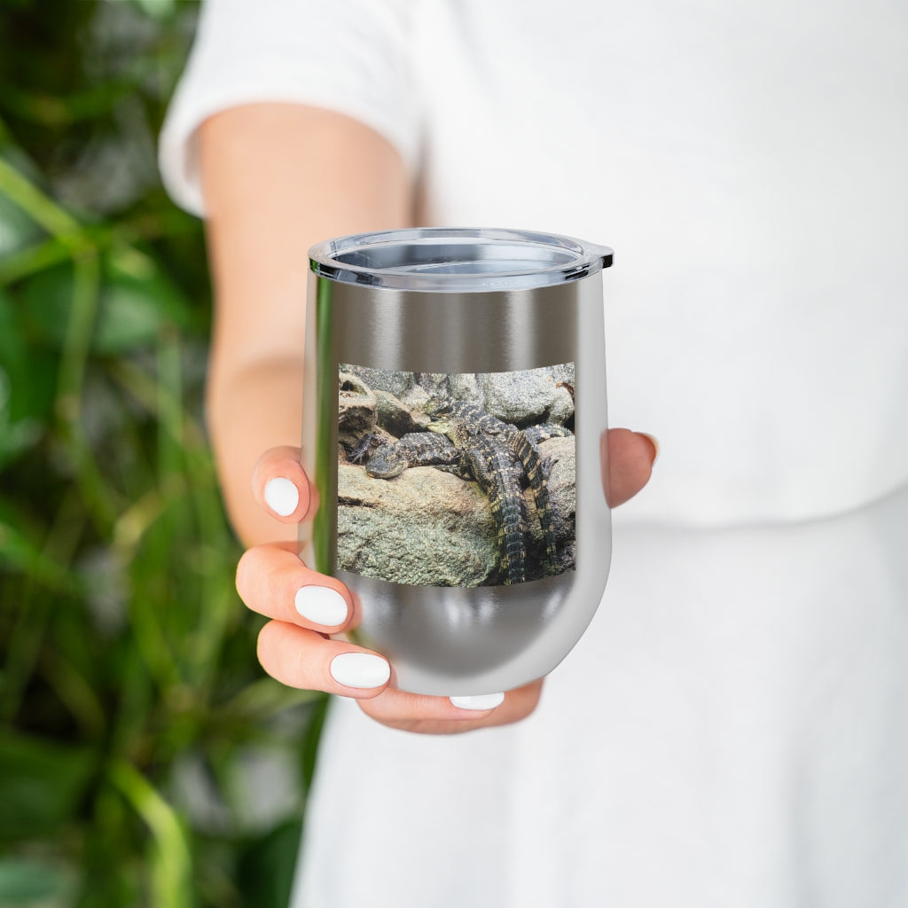 Crocodiles 12oz Insulated Wine Tumbler with clear lid, showcasing stylish design and stainless steel finish.