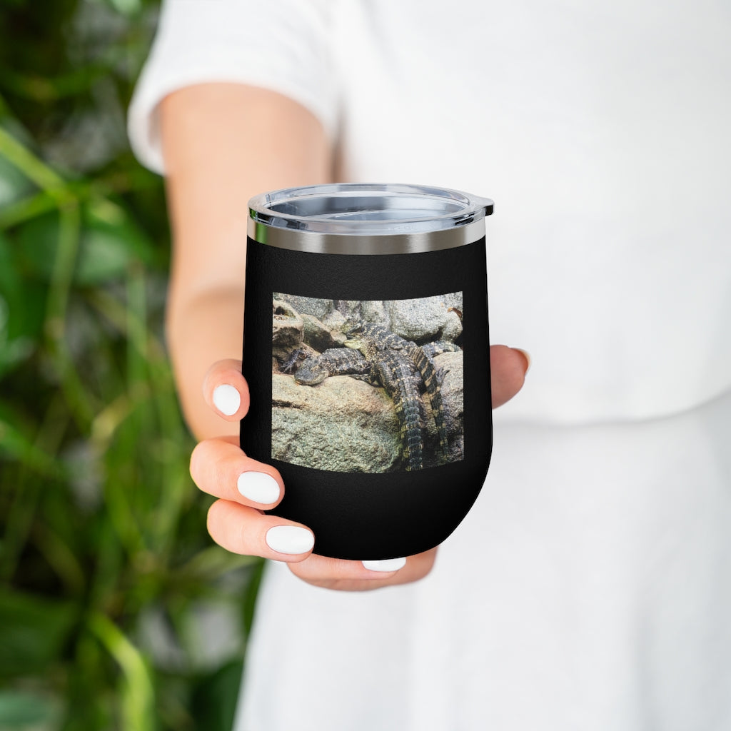 Crocodiles 12oz Insulated Wine Tumbler with clear lid, showcasing stylish design and stainless steel finish.