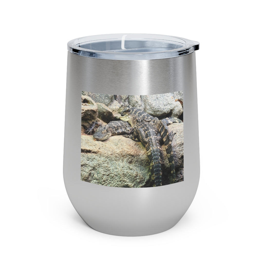 Crocodiles 12oz Insulated Wine Tumbler with clear lid, showcasing stylish design and stainless steel finish.