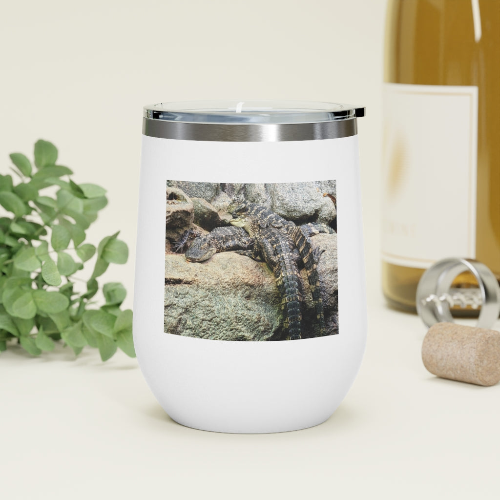 Crocodiles 12oz Insulated Wine Tumbler with clear lid, showcasing stylish design and stainless steel finish.