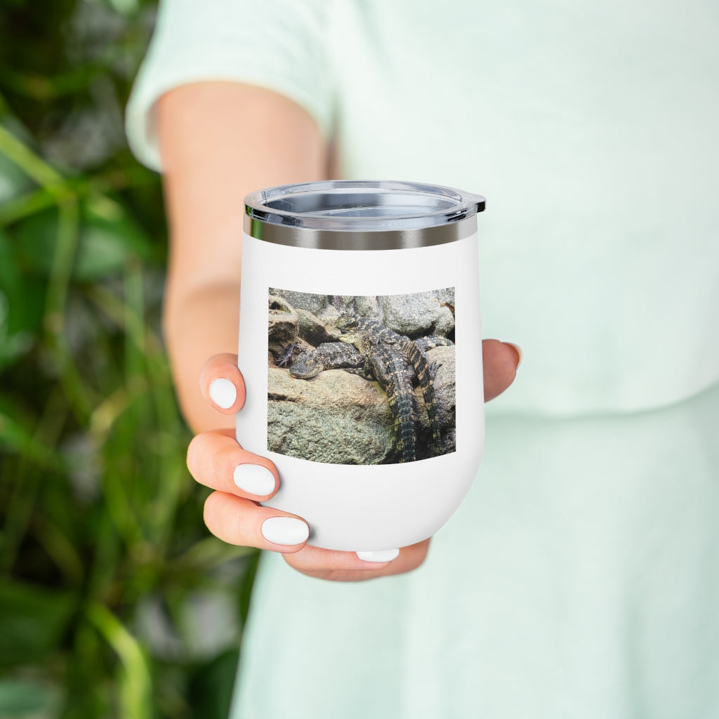 Crocodiles 12oz Insulated Wine Tumbler with clear lid, showcasing stylish design and stainless steel finish.