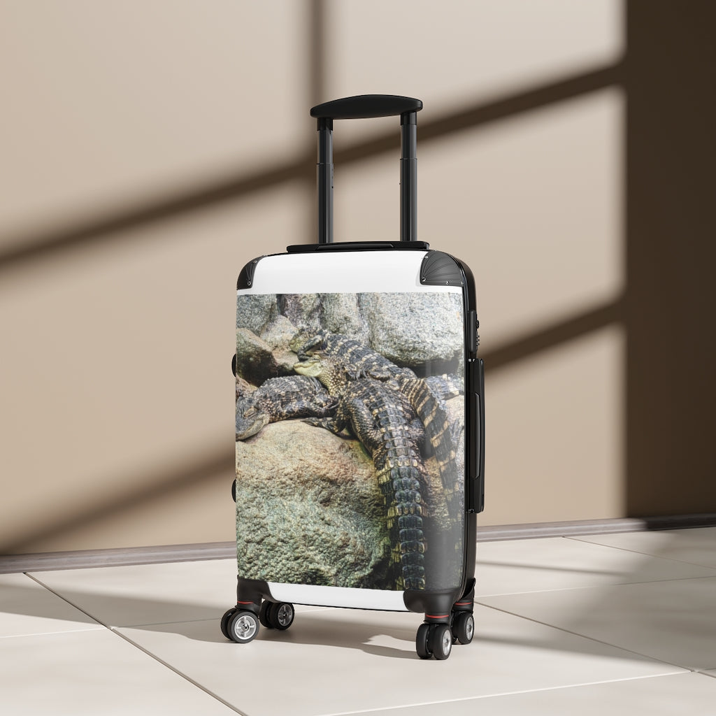 Crocodiles Cabin Suitcase featuring a personalized design, lightweight polycarbonate front, and ABS back, with adjustable handle and 360° swivel wheels.