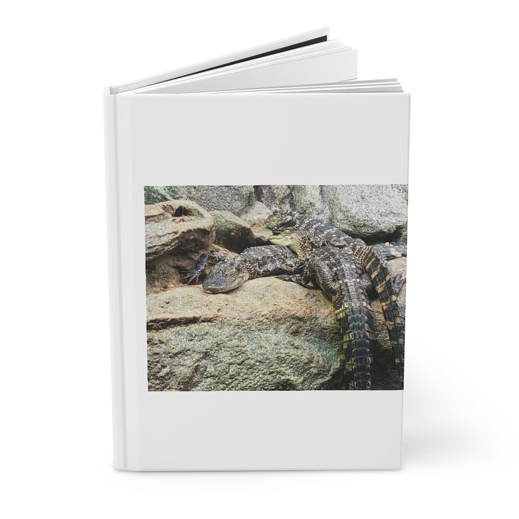 Crocodiles Hardcover Journal with matte finish and customizable covers, featuring lined pages for writing.