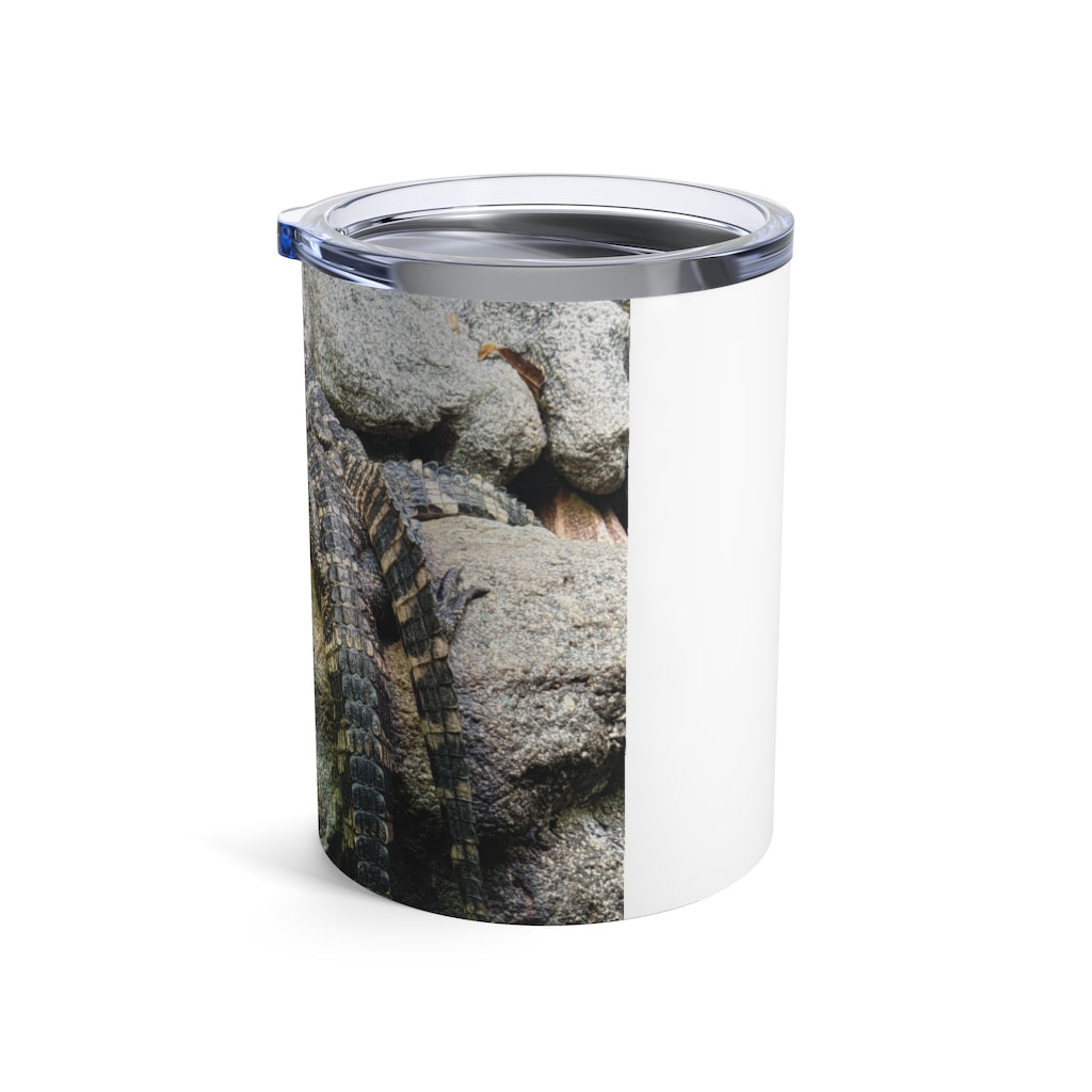 Crocodiles Tumbler 10oz in stainless steel with a see-thru plastic lid, showcasing its sleek design and rounded corners.