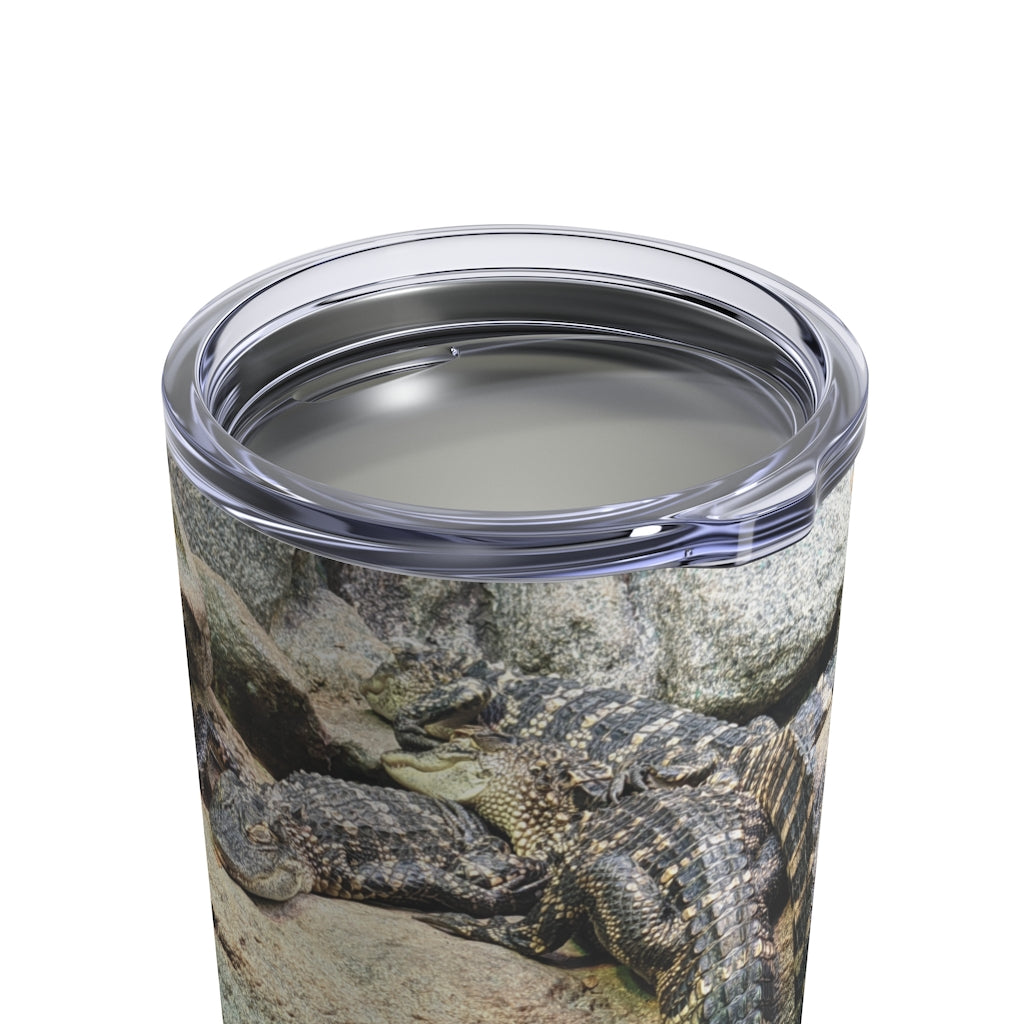 Crocodiles Tumbler 10oz in stainless steel with a see-thru plastic lid, showcasing its sleek design and rounded corners.