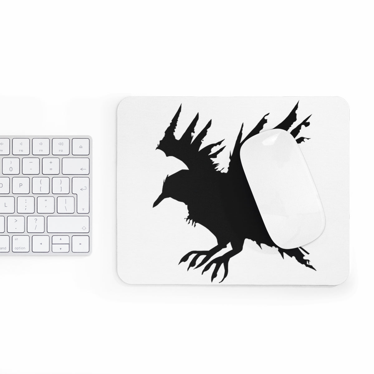 Crow Mousepad featuring a vibrant design on a smooth neoprene surface, ideal for enhancing desk aesthetics and functionality.