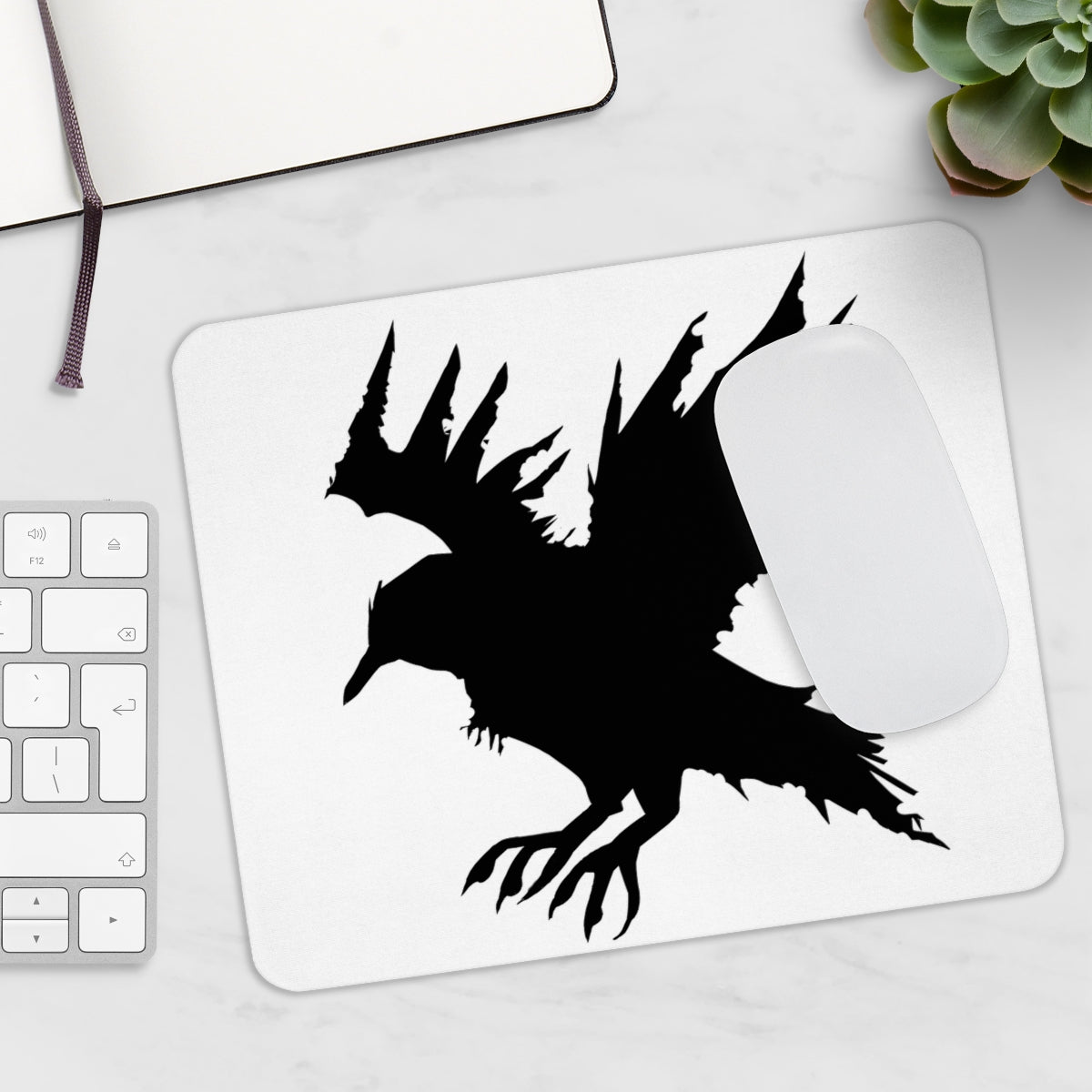 Crow Mousepad featuring a vibrant design on a smooth neoprene surface, ideal for enhancing desk aesthetics and functionality.