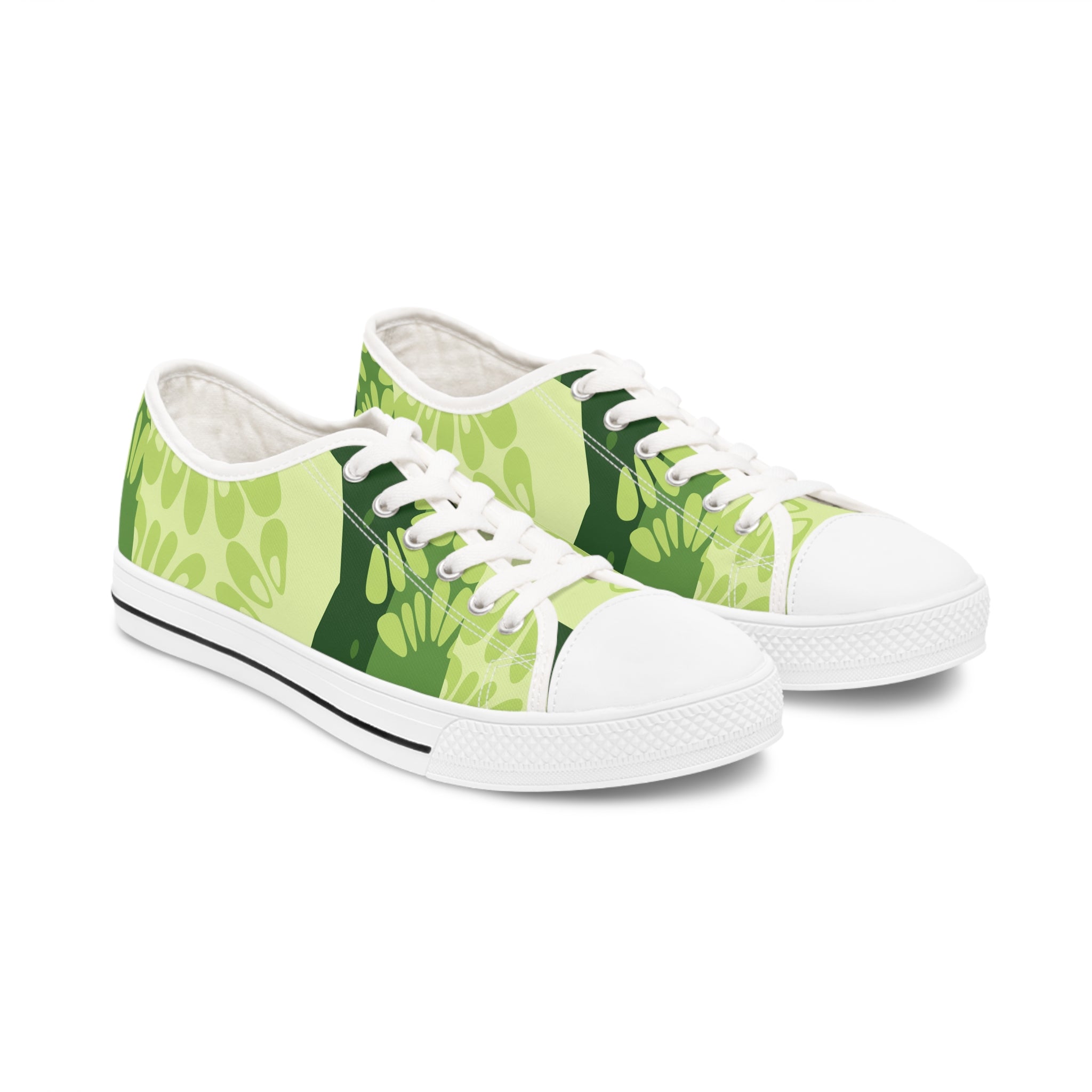 Cucumber Women's Low Top Sneakers in black and white with silver metal eyelets and lace-up closure, showcasing breathable polyester canvas.