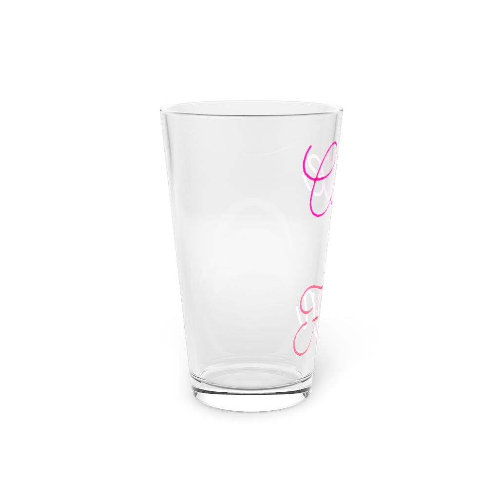 A clear 16oz pint glass with customizable design options, perfect for beverages and gifting.