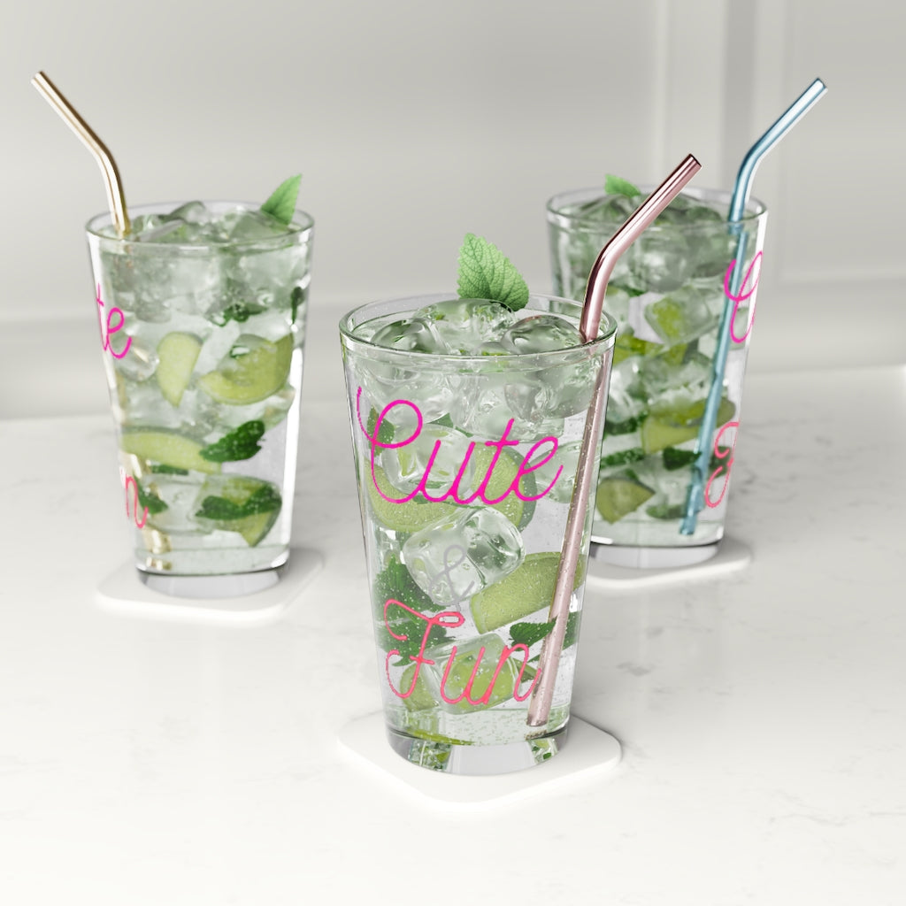 A clear 16oz pint glass with customizable design options, perfect for beverages and gifting.