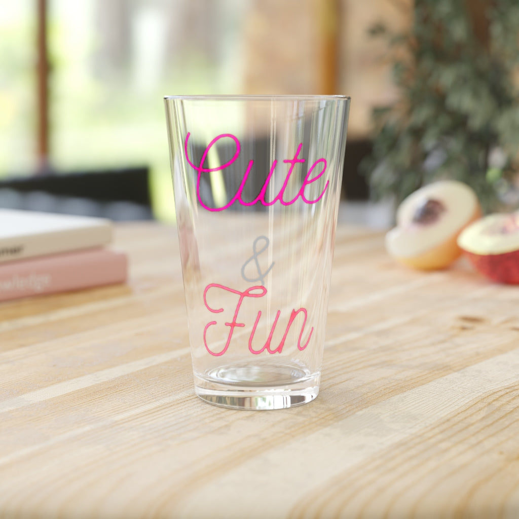 A clear 16oz pint glass with customizable design options, perfect for beverages and gifting.