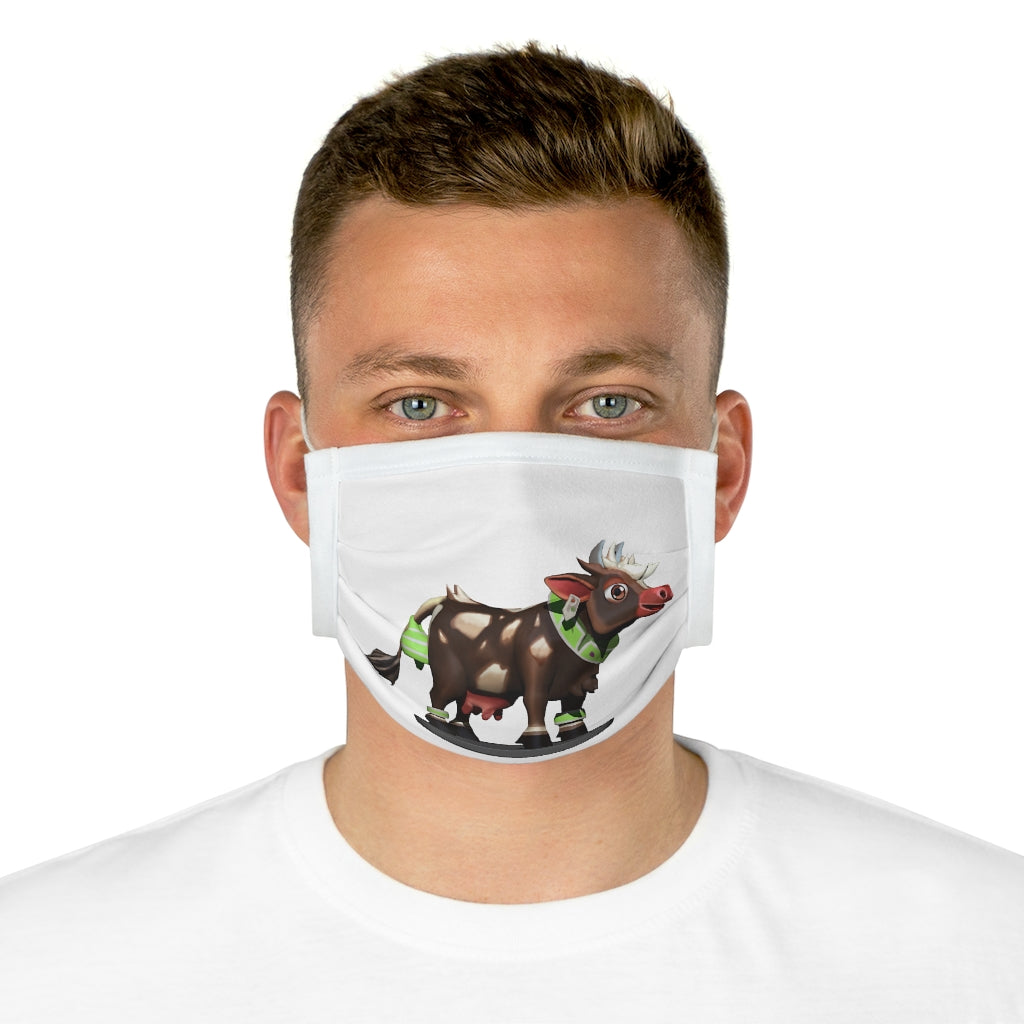 Dark brown cotton face mask featuring a cow print design, with elastic earloops and adjustable nose wire for a comfortable fit.