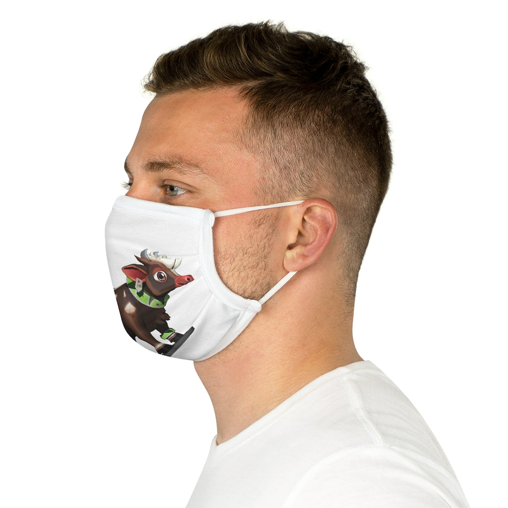 Dark brown cotton face mask featuring a cow print design, with elastic earloops and adjustable nose wire for a comfortable fit.