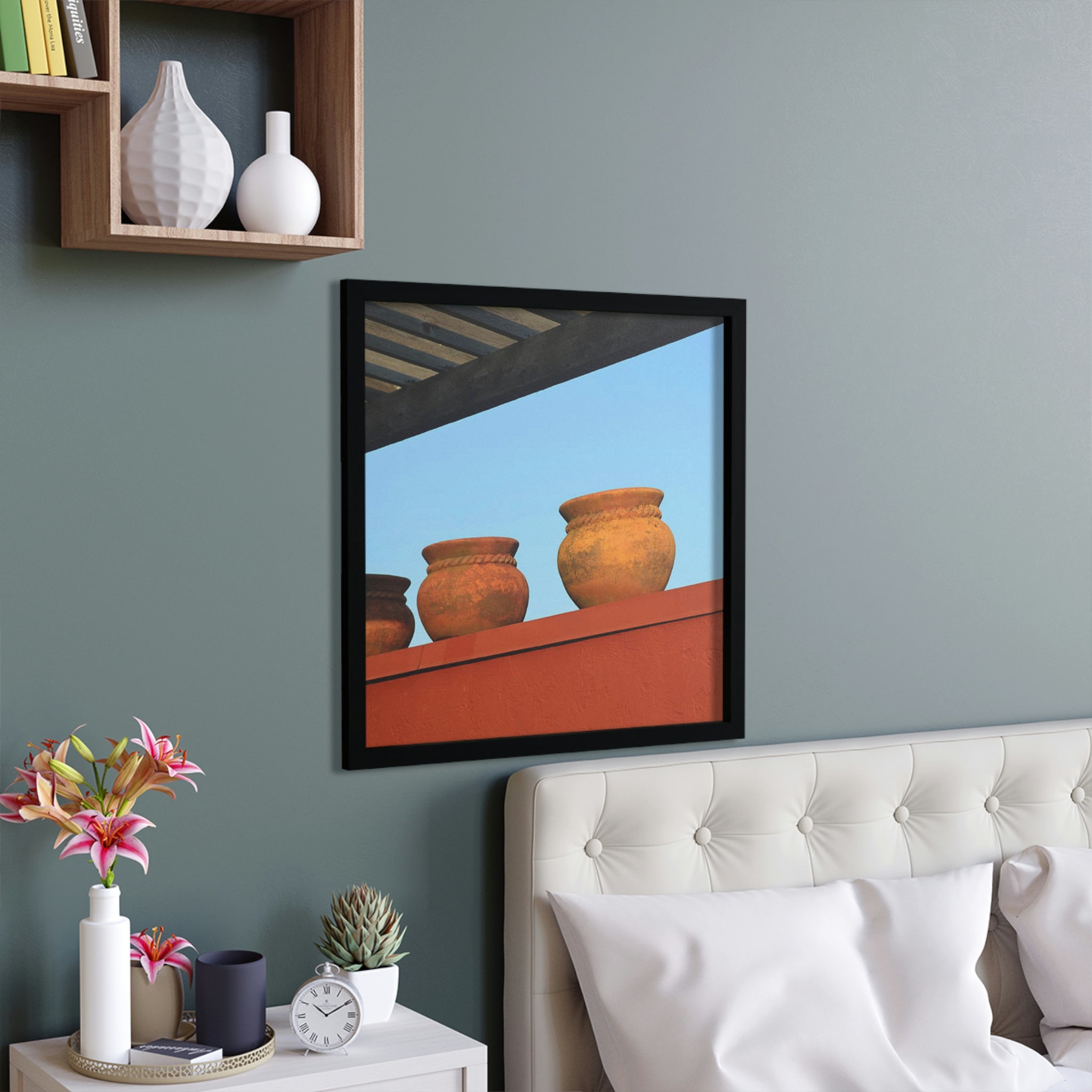 A beautifully framed poster featuring decorative vases, showcasing vibrant colors and a hand-crafted wooden frame, perfect for home decor.