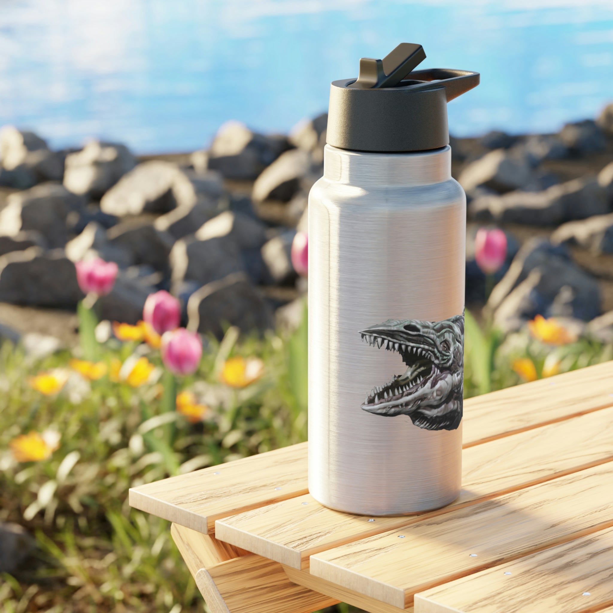 Dino Sea Creature Gator Tumbler, 32oz stainless steel drinkware with a black plastic cap and straw, featuring customizable design.