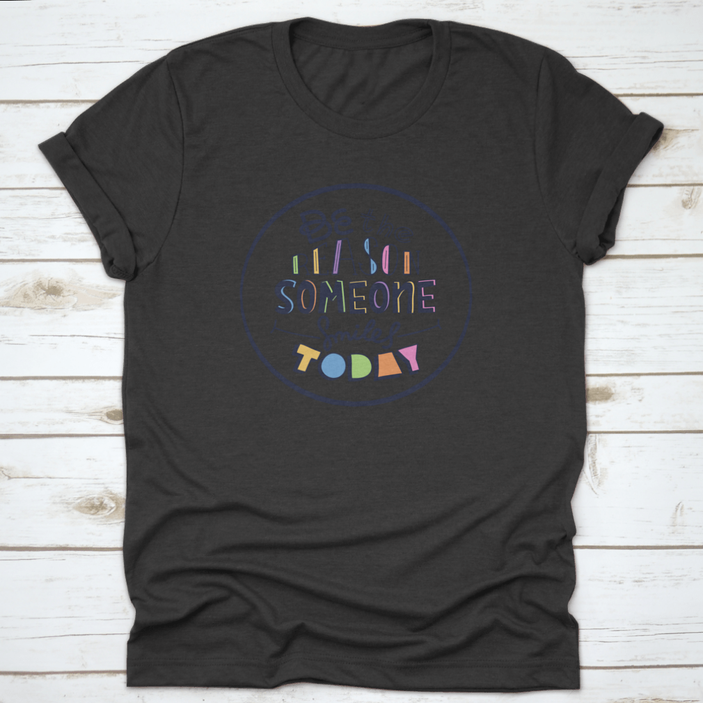 Doodle design t-shirt featuring the message 'Be The Reason Someone' in a stylish and motivational graphic.