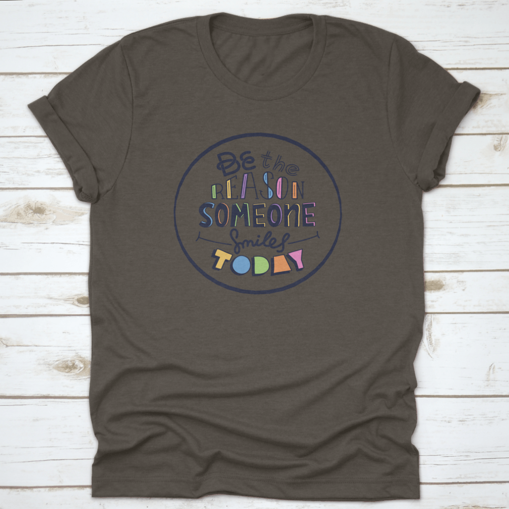 Doodle design t-shirt featuring the message 'Be The Reason Someone' in a stylish and motivational graphic.