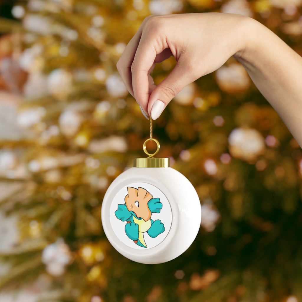 A beautiful 3-inch Dogat Christmas Ball Ornament with a glossy finish, featuring a gold ribbon for hanging and a vintage design.