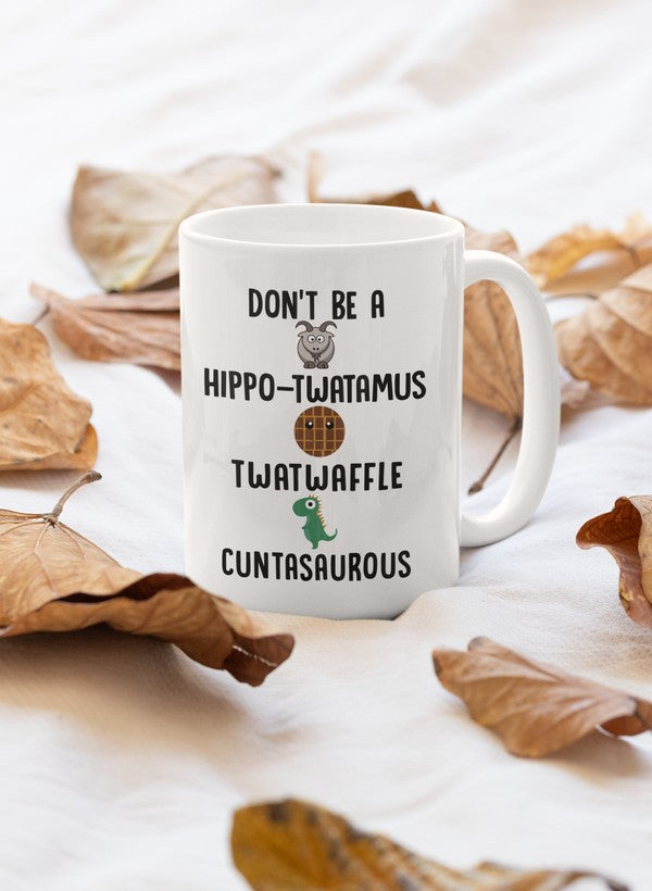 A stylish 11oz ceramic mug with a glossy Orca coating featuring the phrase 'Don't Be A Hippo' in a fun design.