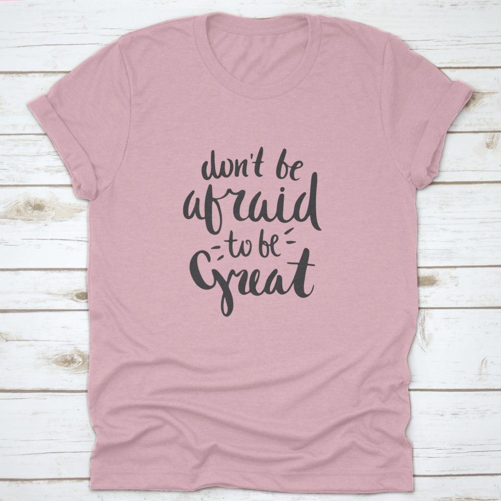 A stylish motivational quote T-shirt featuring the phrase 'Don't Be Afraid To Be Great', made from soft cotton fabric.