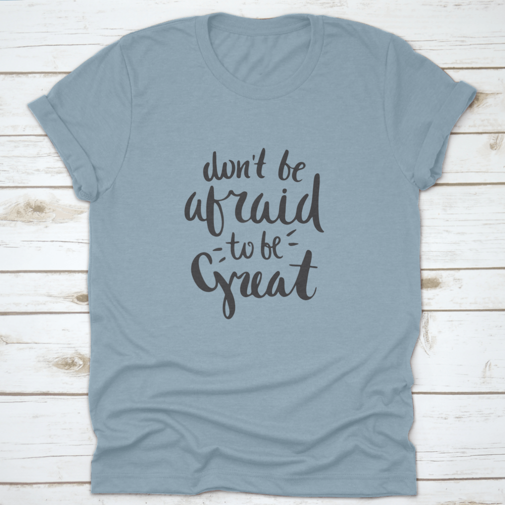 A stylish motivational quote T-shirt featuring the phrase 'Don't Be Afraid To Be Great', made from soft cotton fabric.