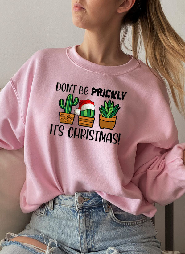 Cozy Don't Be Prickly It's Christmas Sweat Shirt featuring festive design and adjustable cuffs.