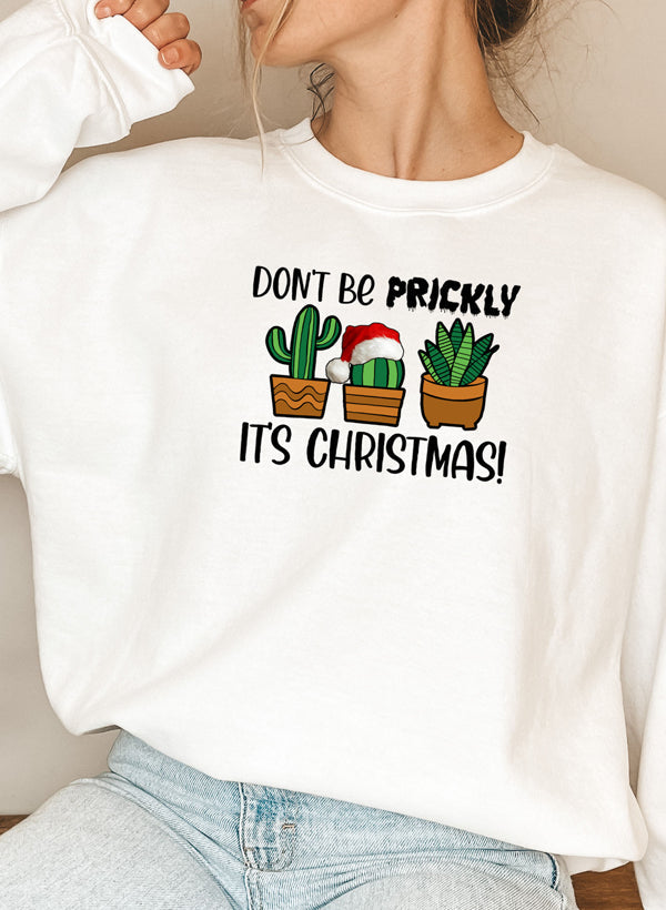 Cozy Don't Be Prickly It's Christmas Sweat Shirt featuring festive design and adjustable cuffs.