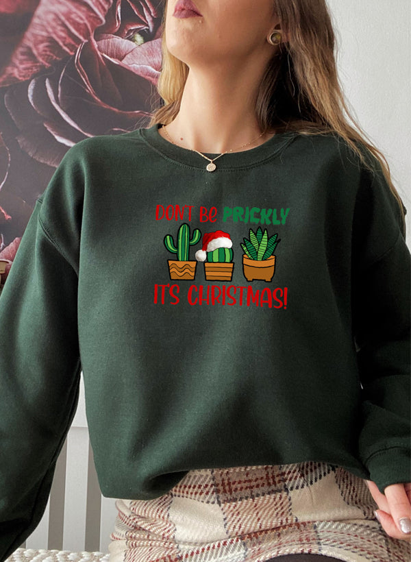 Cozy Don't Be Prickly It's Christmas Sweat Shirt featuring festive design and adjustable cuffs.