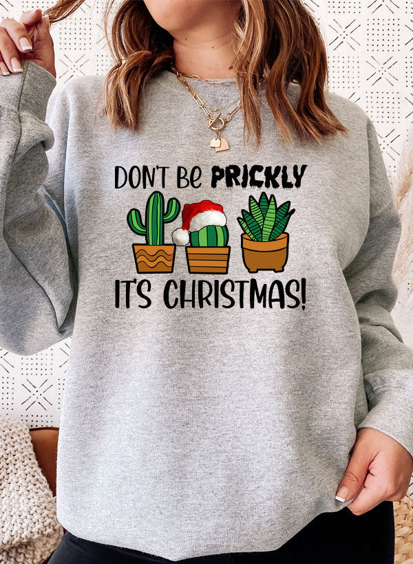 Cozy Don't Be Prickly It's Christmas Sweat Shirt featuring festive design and adjustable cuffs.