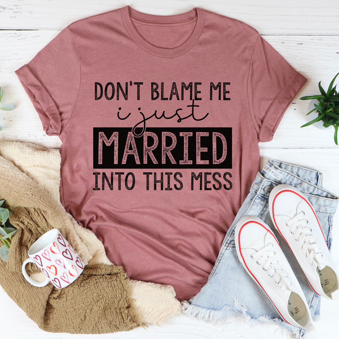 A humorous t-shirt featuring the phrase 'Don't Blame Me I Just Married Into This', made from soft cotton with double stitching.