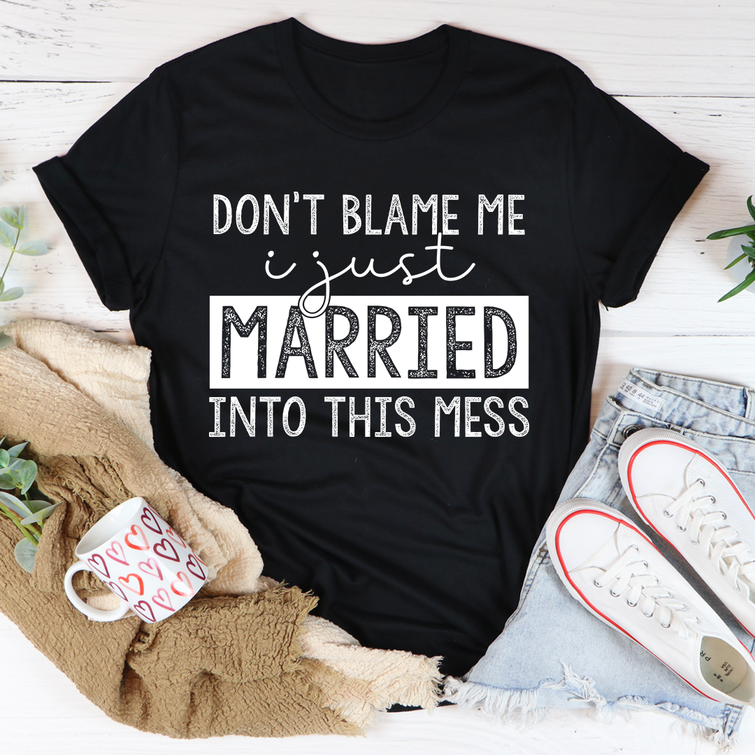 A humorous t-shirt featuring the phrase 'Don't Blame Me I Just Married Into This', made from soft cotton with double stitching.