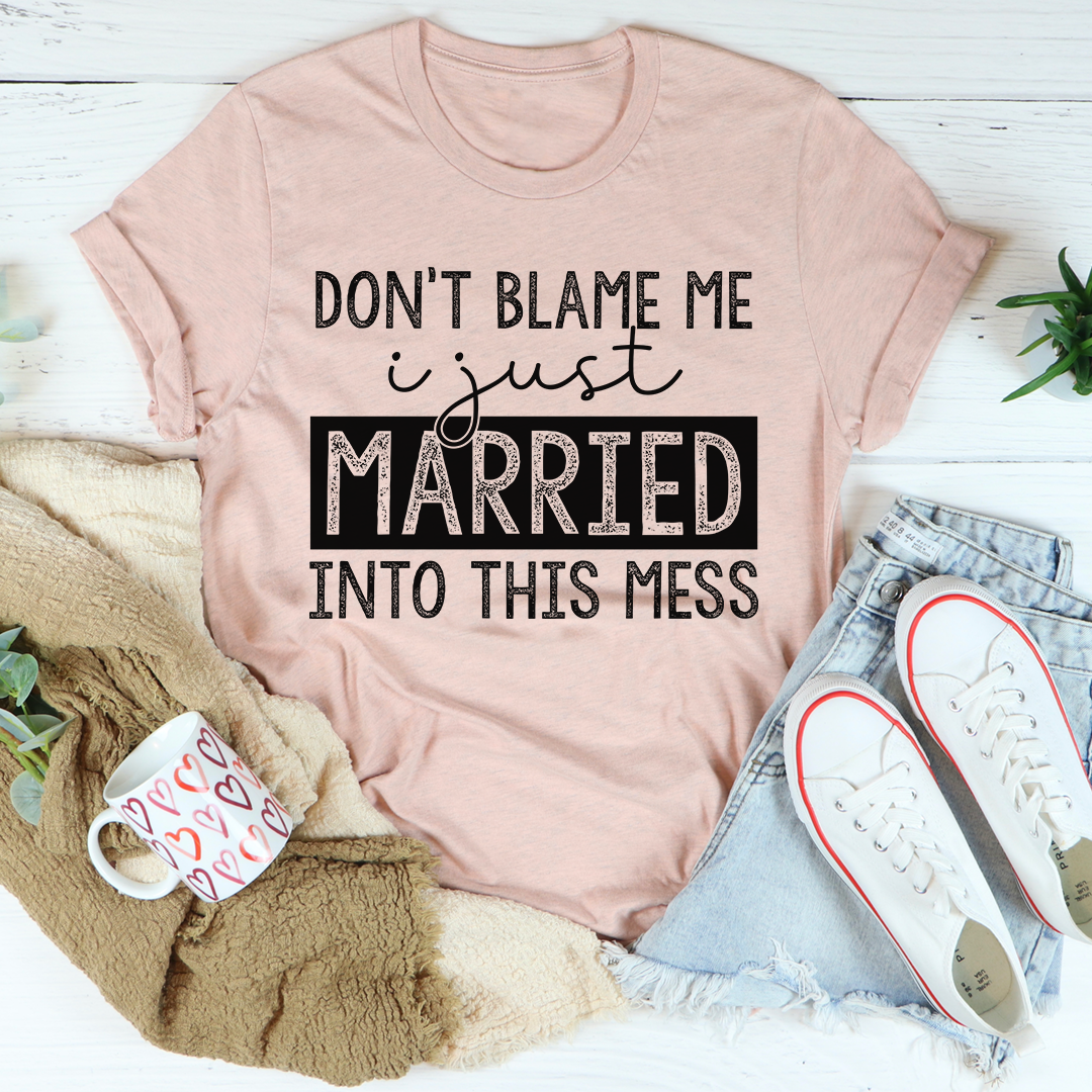 A humorous t-shirt featuring the phrase 'Don't Blame Me I Just Married Into This', made from soft cotton with double stitching.