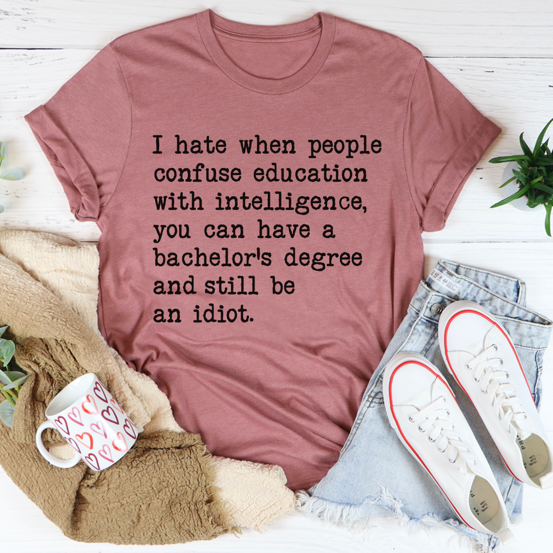 A comfortable Don't Confuse Education With Intelligent T-Shirt made from soft ring-spun cotton, featuring a humorous print.