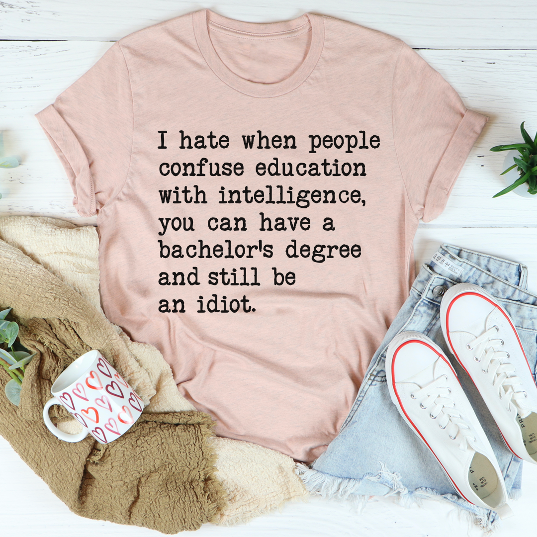 A comfortable Don't Confuse Education With Intelligent T-Shirt made from soft ring-spun cotton, featuring a humorous print.