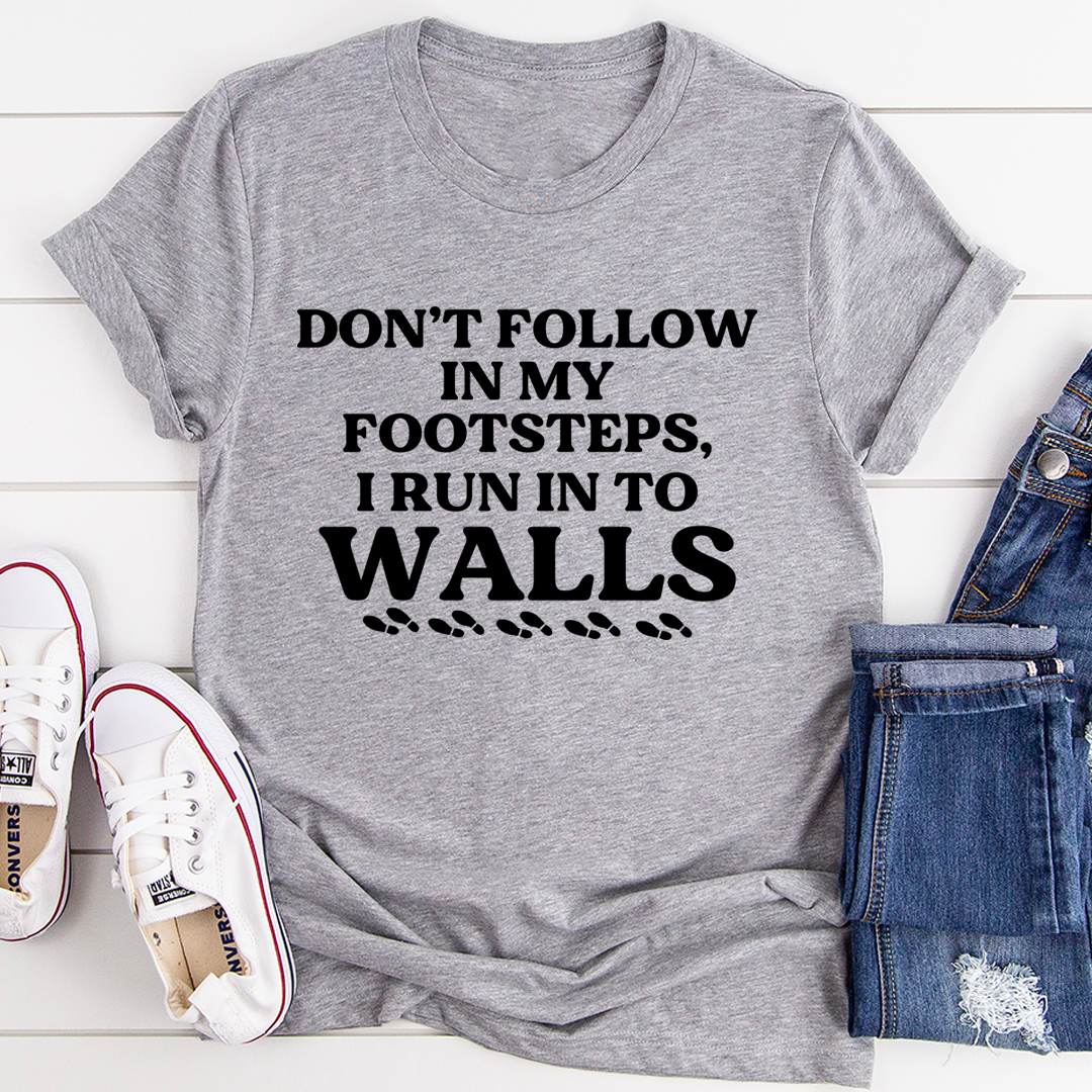 A stylish Don't Follow In My Footsteps T-Shirt made from soft ring-spun cotton, featuring double stitching for durability.