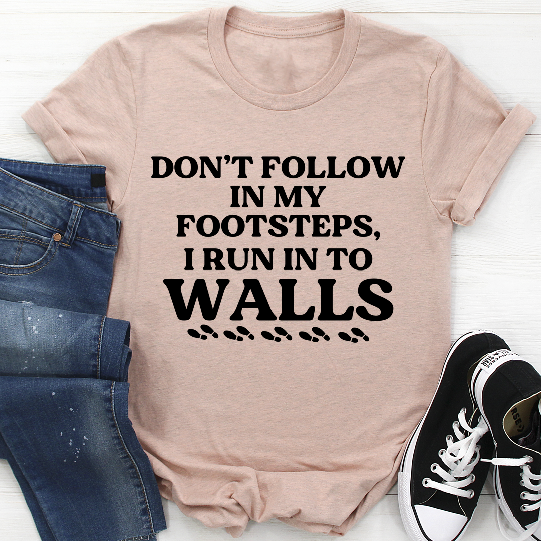 A stylish Don't Follow In My Footsteps T-Shirt made from soft ring-spun cotton, featuring double stitching for durability.