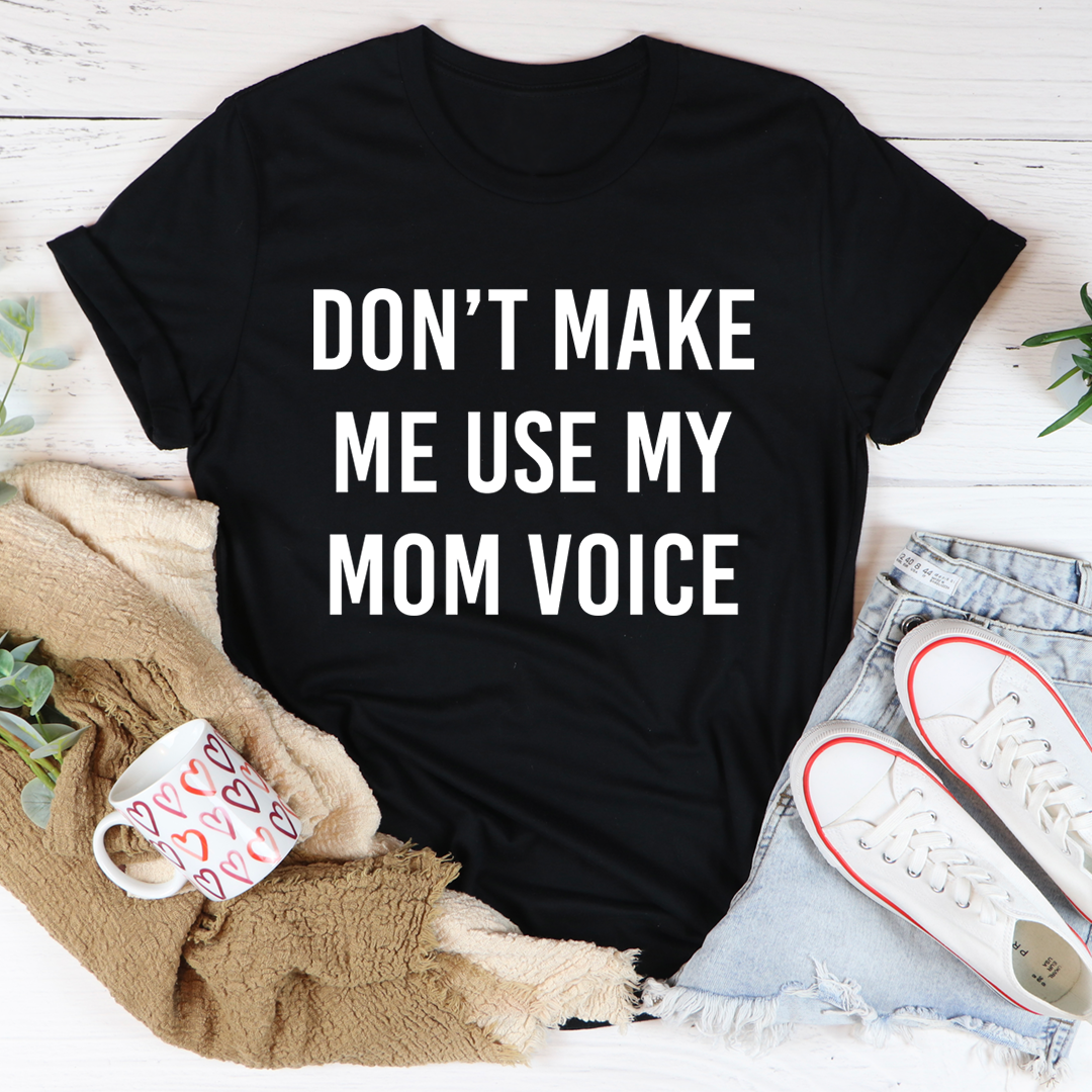 A comfortable and stylish Don't Make Me Use My Mom Voice T-Shirt made from soft ring-spun cotton, featuring double stitching for durability.