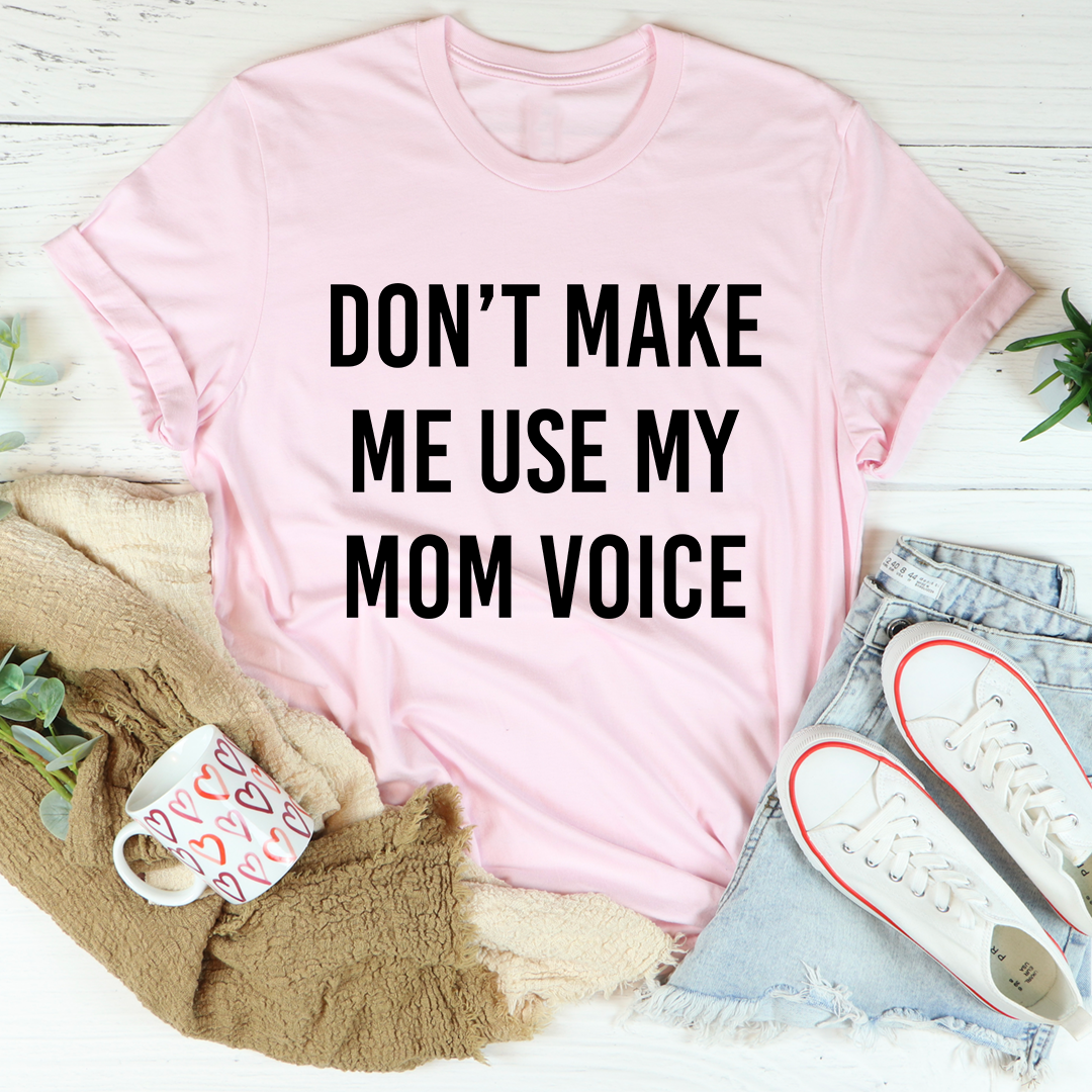 A comfortable and stylish Don't Make Me Use My Mom Voice T-Shirt made from soft ring-spun cotton, featuring double stitching for durability.