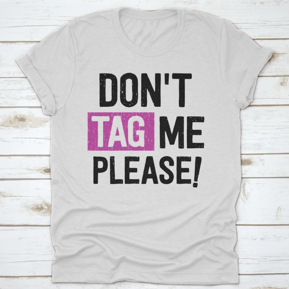 A stylish 'Don't Tag Me Please!' T-Shirt made from 100% cotton, featuring a classic fit and comfortable design.