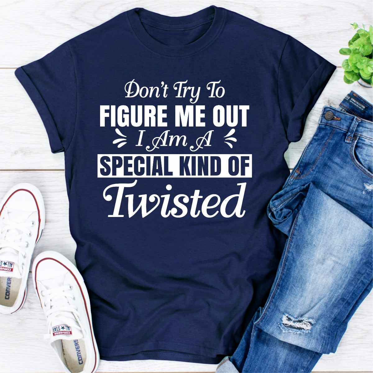 A stylish black t-shirt with the phrase 'Don't Try To Figure Me Out I'm A Special Kind Of Twisted' printed in bold white letters.